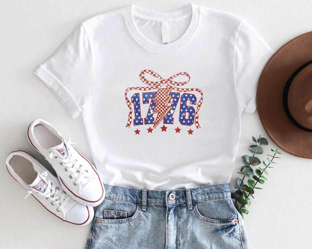 1776 Lightning Bolt Patriotic Bow T-Shirt – 4th of July USA Graphic Tee 1776 Lightning Bolt Patriotic Bow T-Shirt – 4th of July USA Graphic Tee